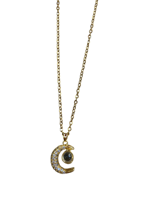 Stainless steel chain with moon design with diamonds and a circle